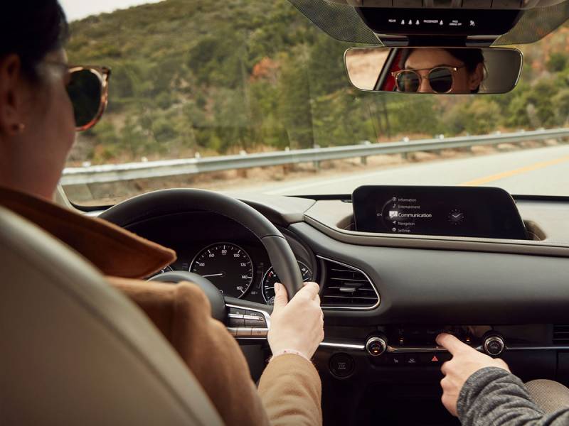 driving car with tech featured